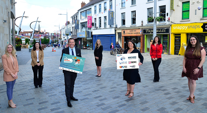 Representatives of the six FE colleges on high street in Lisburn with Glyn Roberts Retail NI